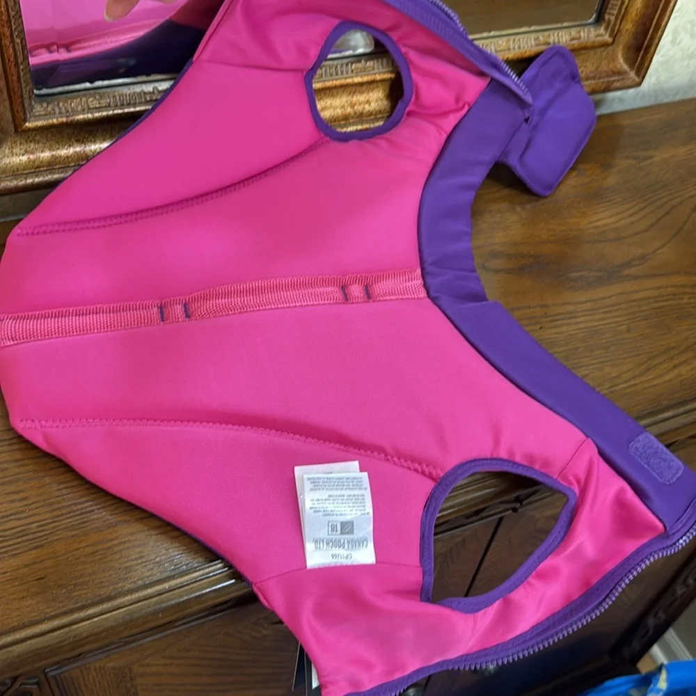 New High Tide life jacket by Canada Pooch for swimming. Pink and Purple. Size 18